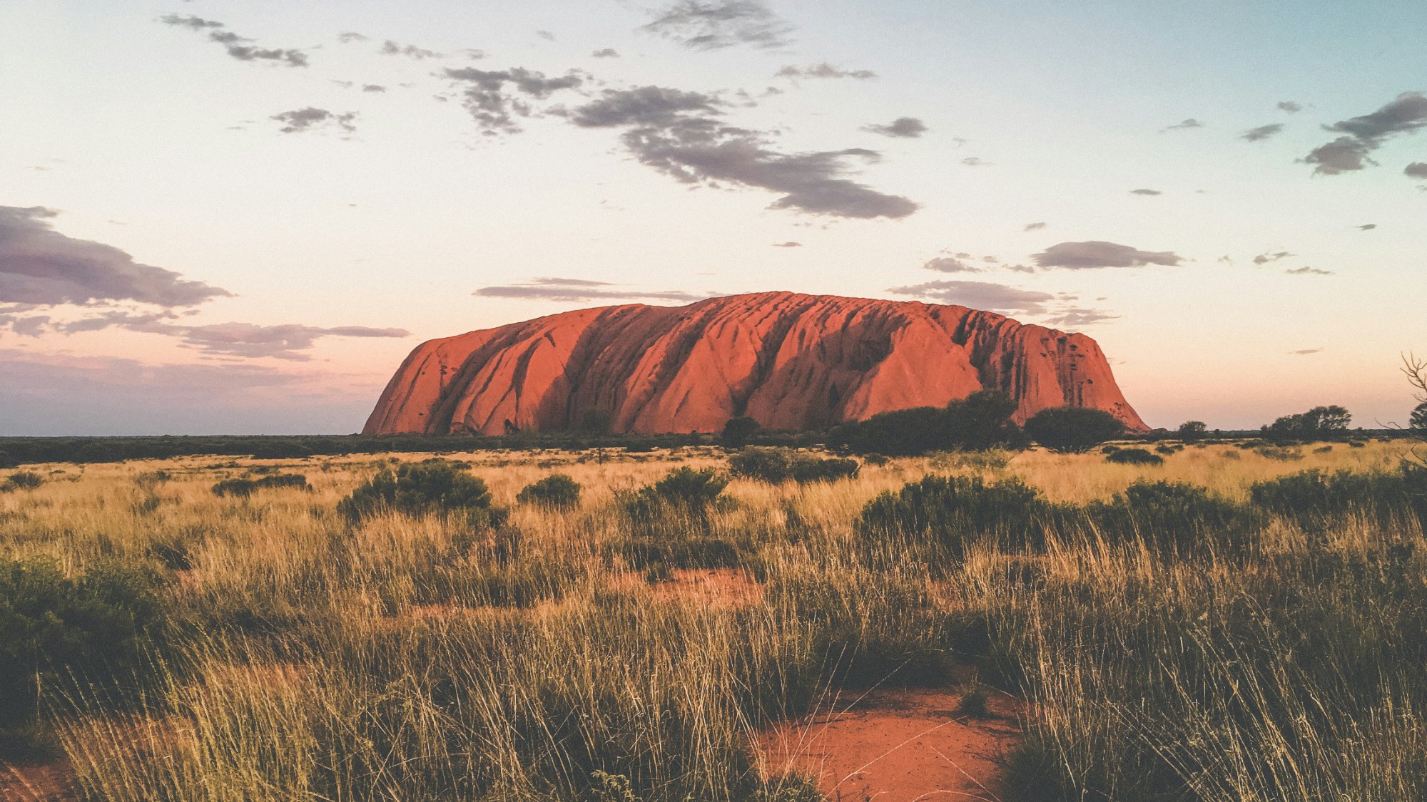 Uluru at sunset – the heart of the oldest dream tradition on Earth, 65,000 years of continuous culture