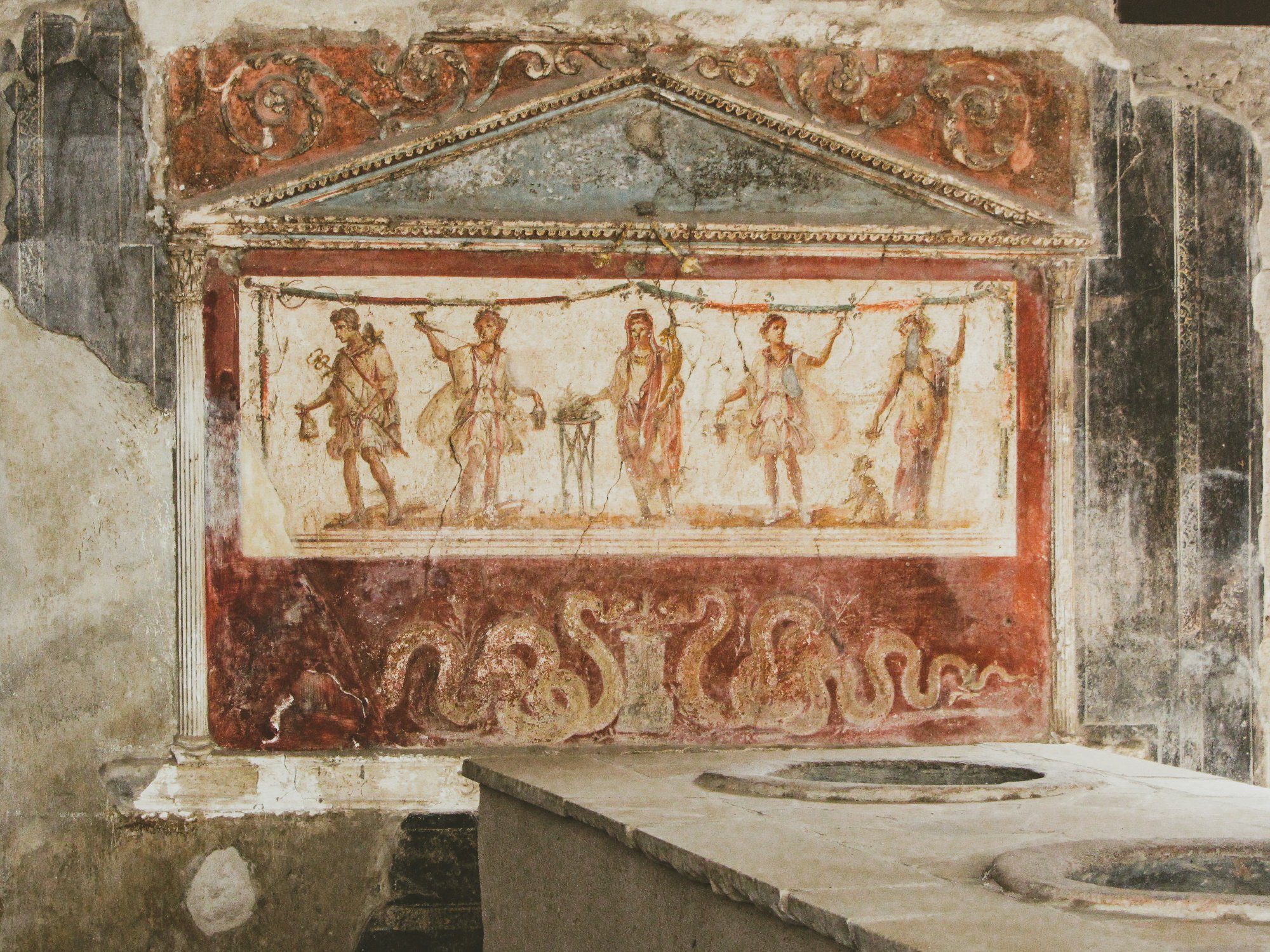 Ancient Etruscan fresco with mythological figures and serpents – the mysterious dream masters of pre-Roman Italy