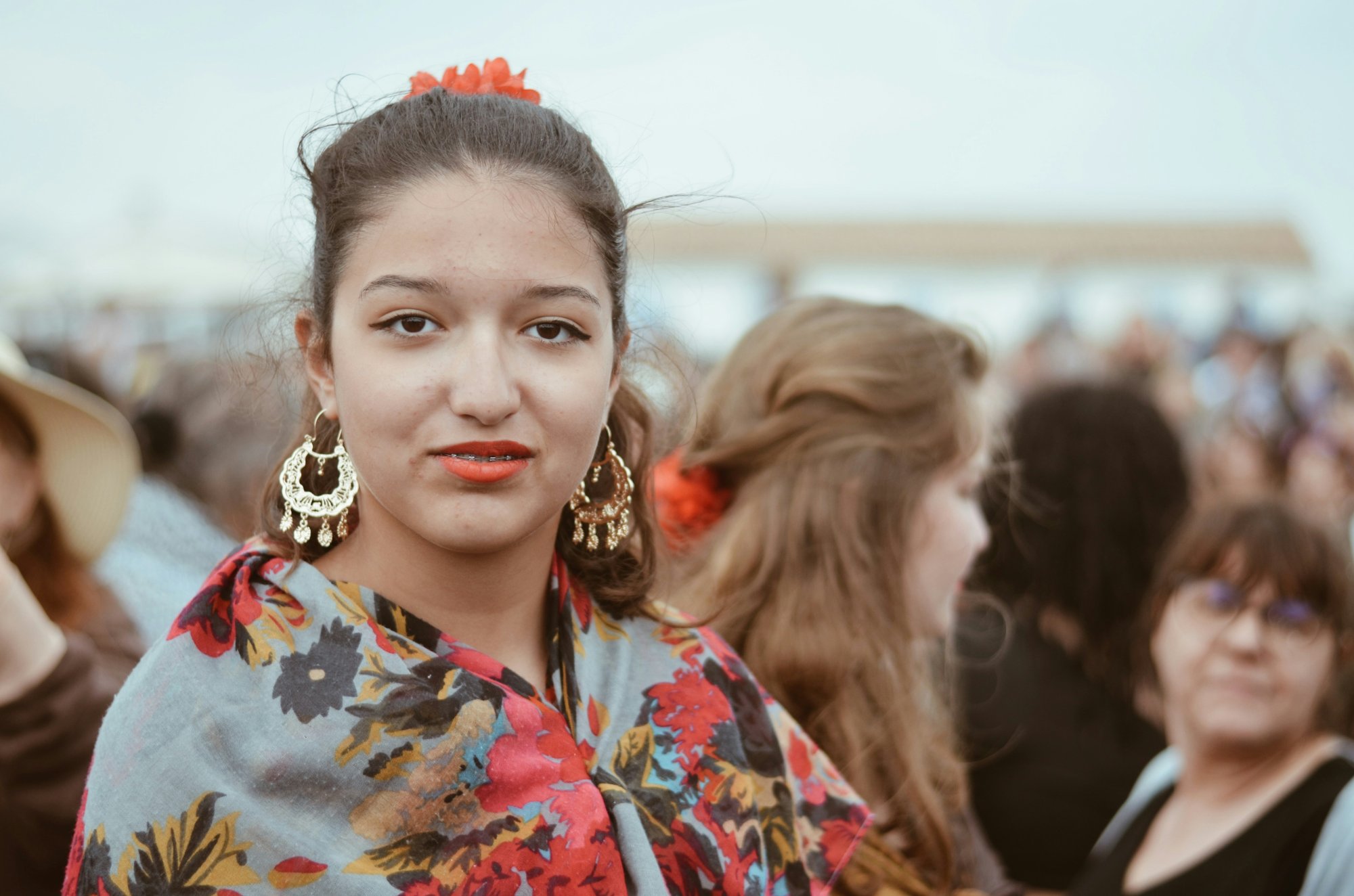 Young Romani woman in traditional colorful dress – bearer of an unwritten dream wisdom tradition